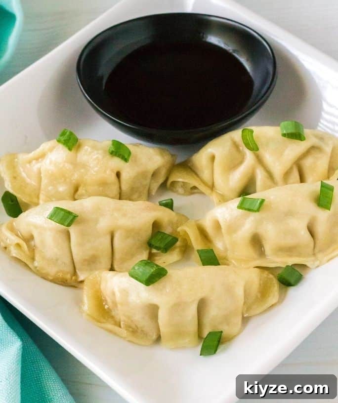 Top Instant Pot Asian Recipes for Flavorful Weeknight Meals 10 white plate serving Instant Pot frozen dumplings
