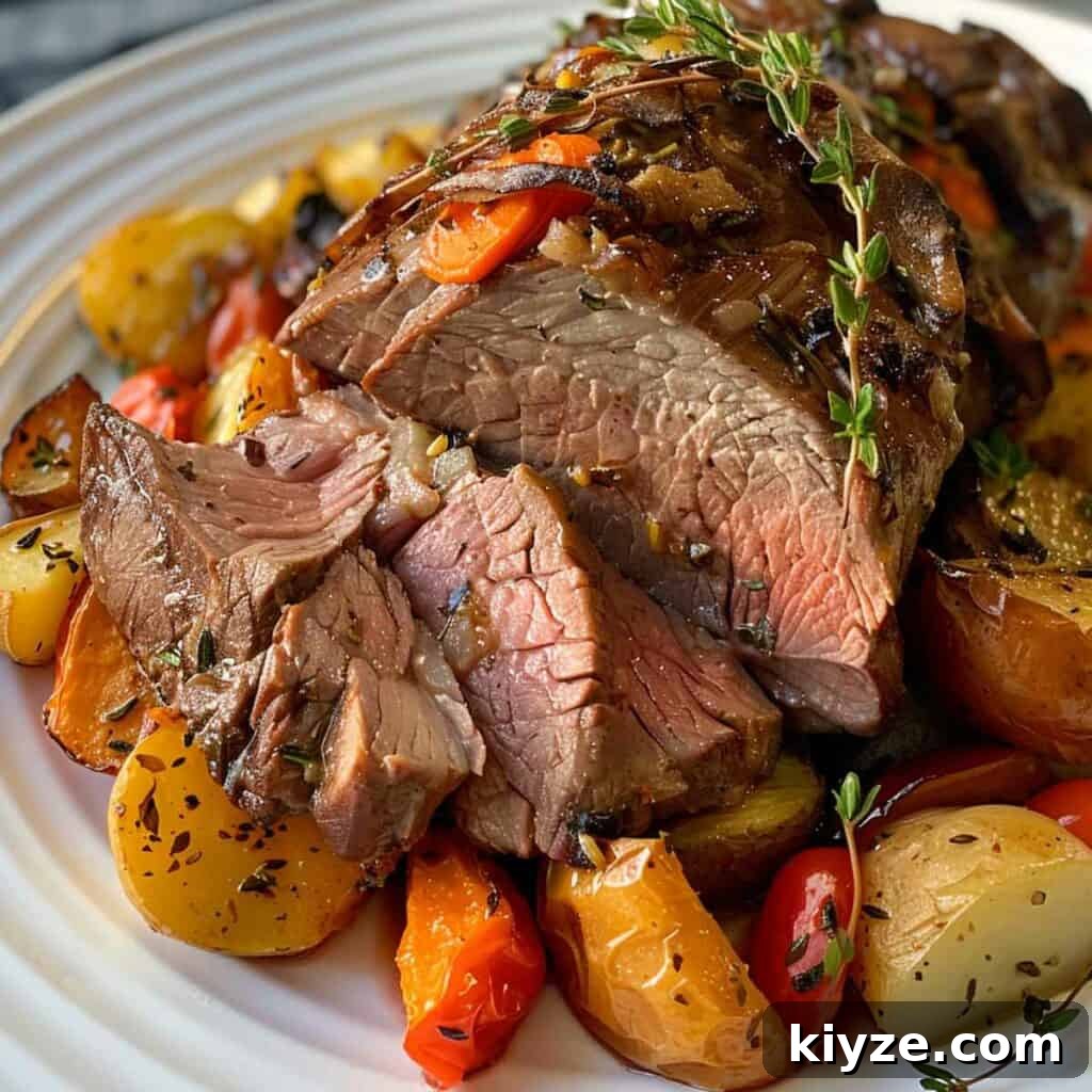 Fresh Rosemary Guide: How to Prep, Cook, and Store Herb Successfully 12 Roasted lamb with potatoes and vegetables on a plate.