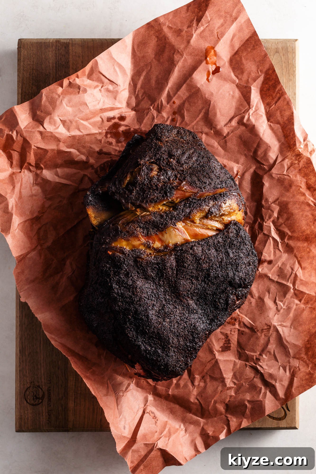 How Long to Cook a 10‑Pound Pork Shoulder: Roast, Braise, or Smoke 2 smoked pork shoulder on peach butcher paper