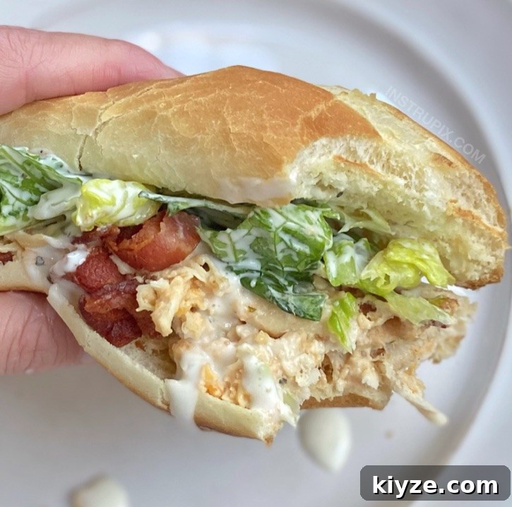 Slow-Cooker Crack Chicken Sandwich Recipe That Melts in Your Mouth 5 Easy Slow Cooker Shredded Chicken Sandwiches (made with cream cheese, cheddar, ranch, bacon and lettuce!)