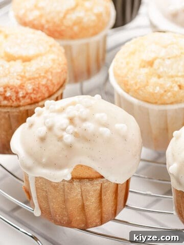 vanilla muffins on wire rack.