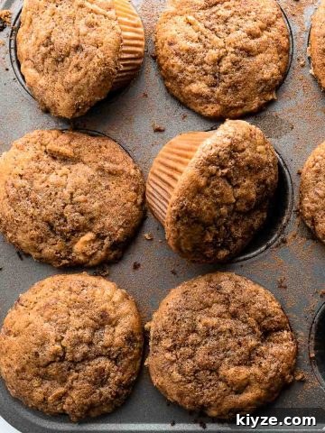 apple muffins in muffin tin