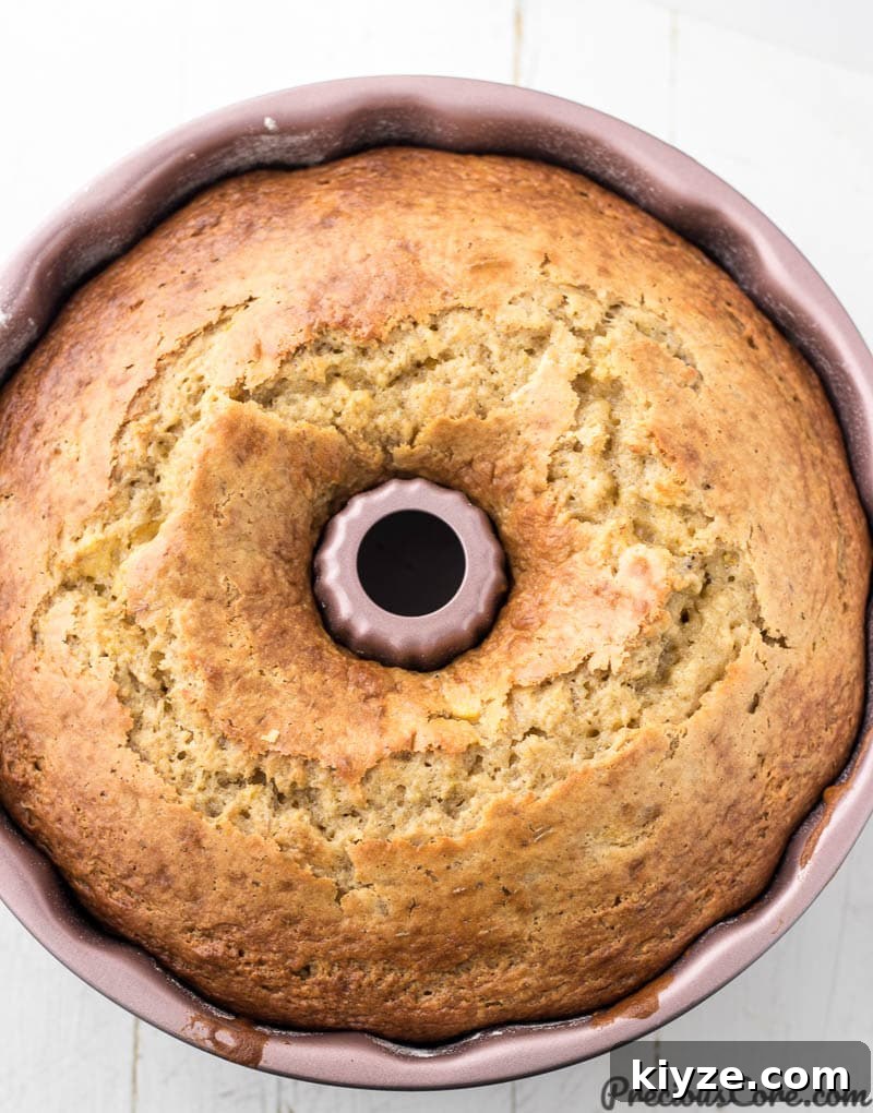 Moist Plantain Cake Recipe with Coconut Frosting 3 Cake in bundt pan with cracked top