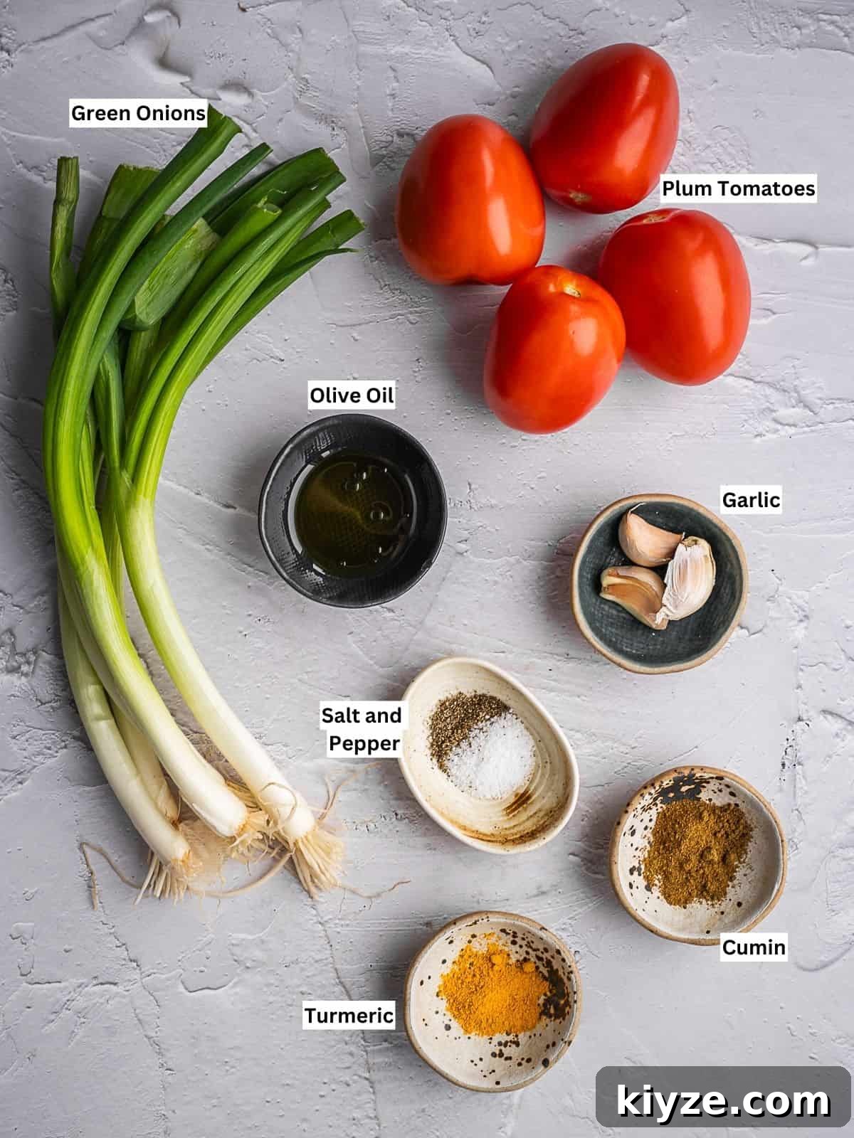 Hogao: Authentic Colombian Tomato and Scallion Creole Sauce Recipe 3 Hogao recipe ingredients with individual labels on a board.