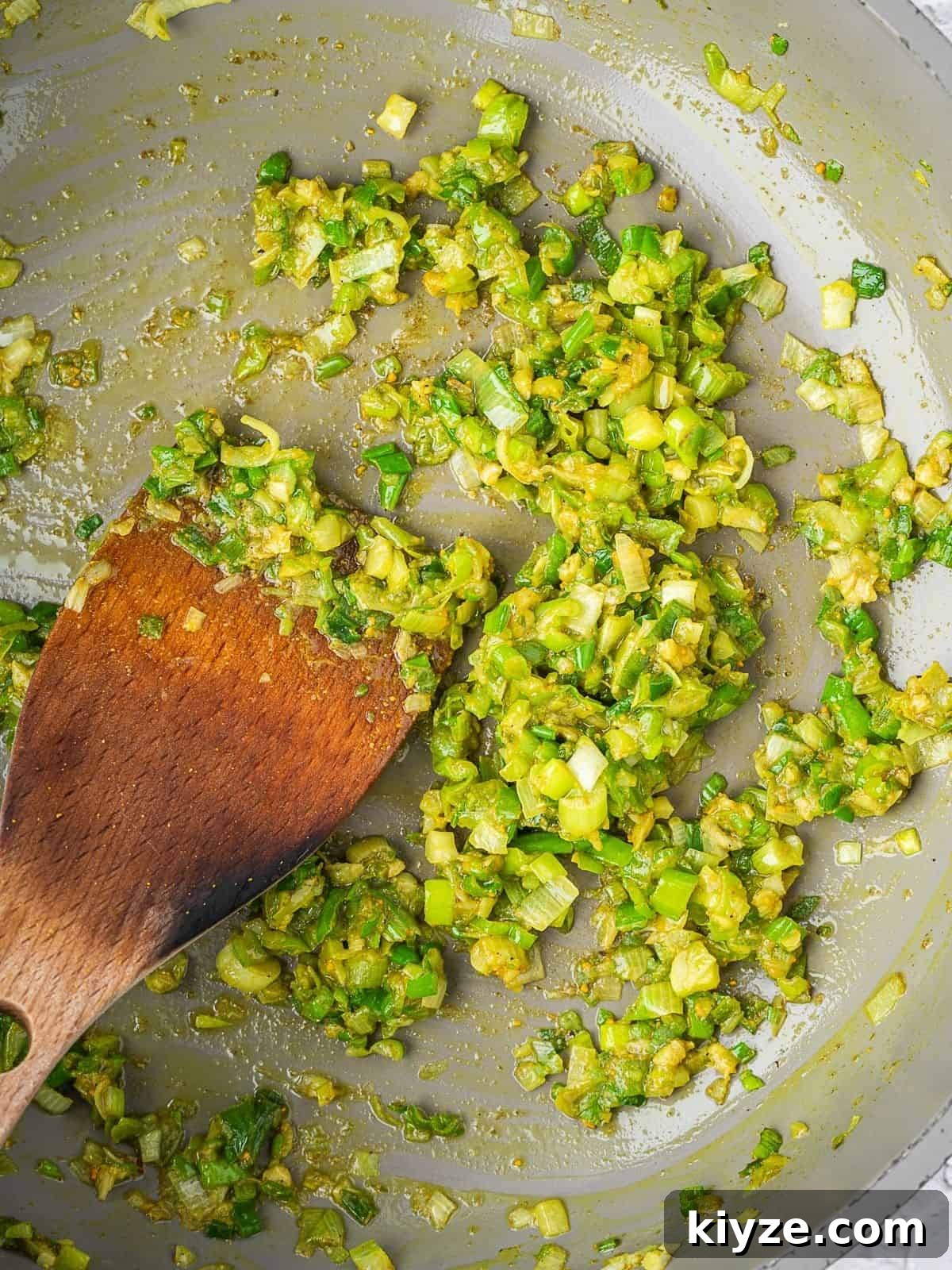 Hogao: Authentic Colombian Tomato and Scallion Creole Sauce Recipe 4 Frying pan with softened green onions.
