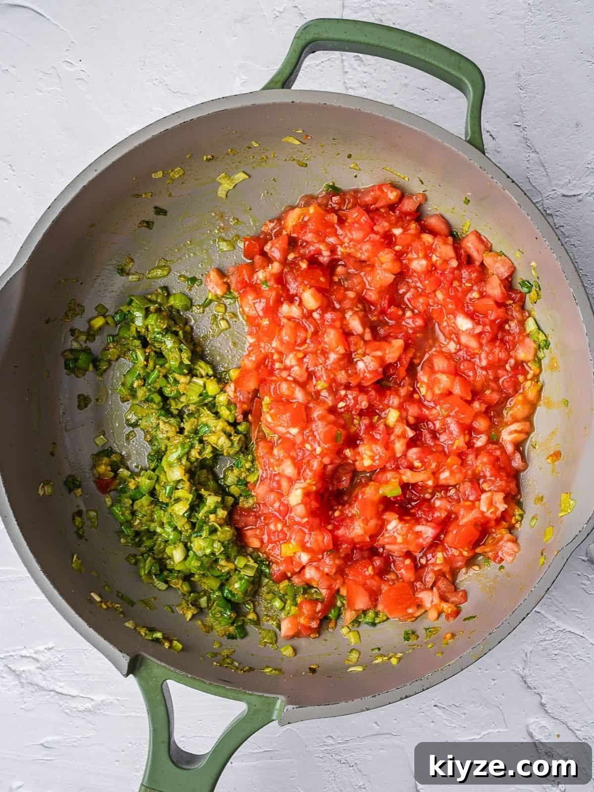 Hogao: Authentic Colombian Tomato and Scallion Creole Sauce Recipe 5 Frying pan with crushed tomatoes added to the cooked scallions.