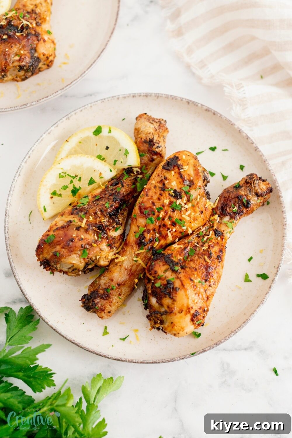 Crispy Lemon Garlic Chicken Drumsticks (Air Fryer Recipe) 4 Tangy air fryer lemon garlic chicken drumsticks, a simple yet flavorful addition to any meal.