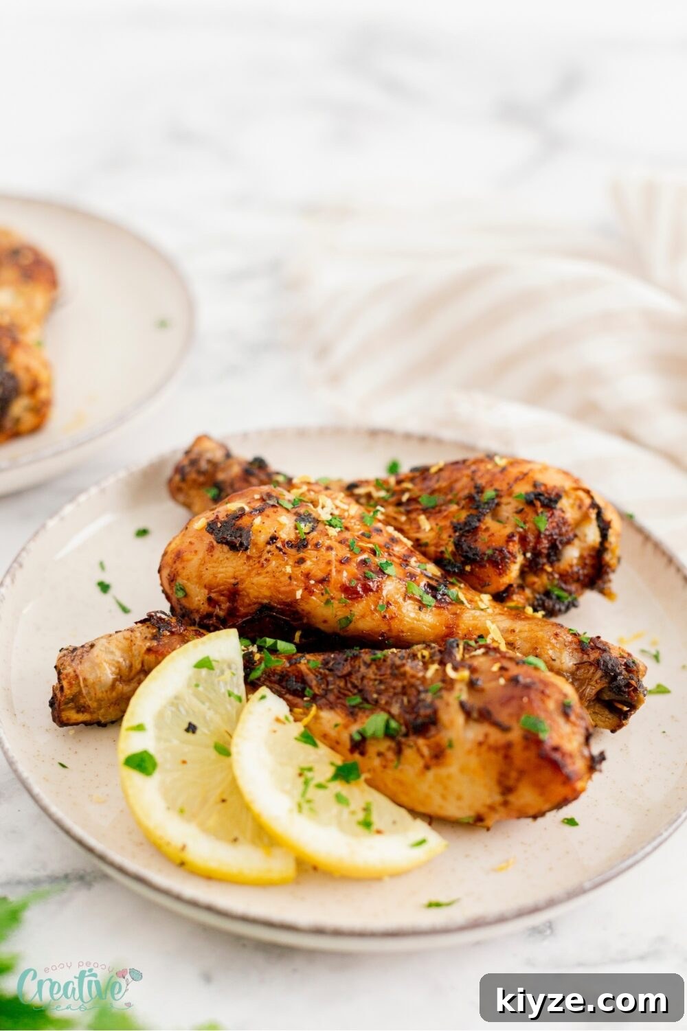 Crispy Lemon Garlic Chicken Drumsticks (Air Fryer Recipe) 5 Delicious baked lemon chicken drumsticks - a perfect blend of zesty lemon and heartwarming chicken goodness!