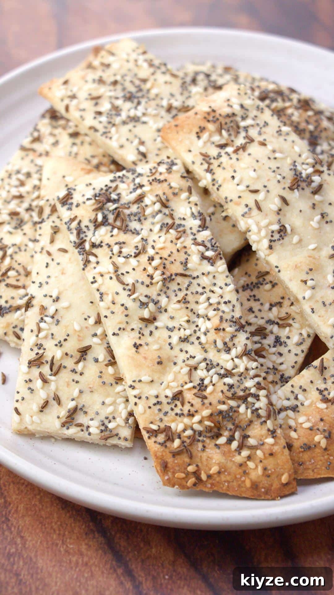 Three-Seed Homemade Crackers Recipe for Crispy, Crunchy Snacks 11 Plate full of homemade crackers.