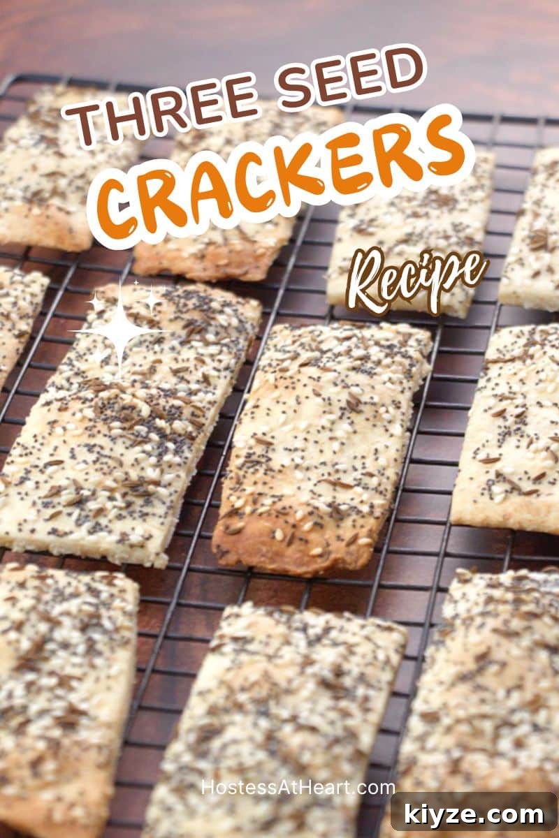 Three-Seed Homemade Crackers Recipe for Crispy, Crunchy Snacks 13 Front view of homemade crackers sitting on a cooling rack. Hostess At Heart