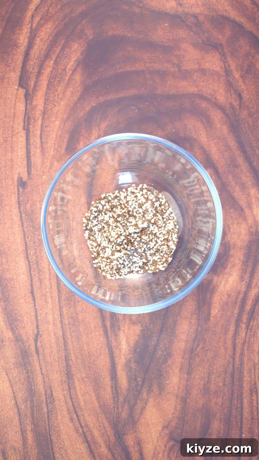 Three-Seed Homemade Crackers Recipe for Crispy, Crunchy Snacks 4 Three types of seeds mixed together in a small mixing bowl.