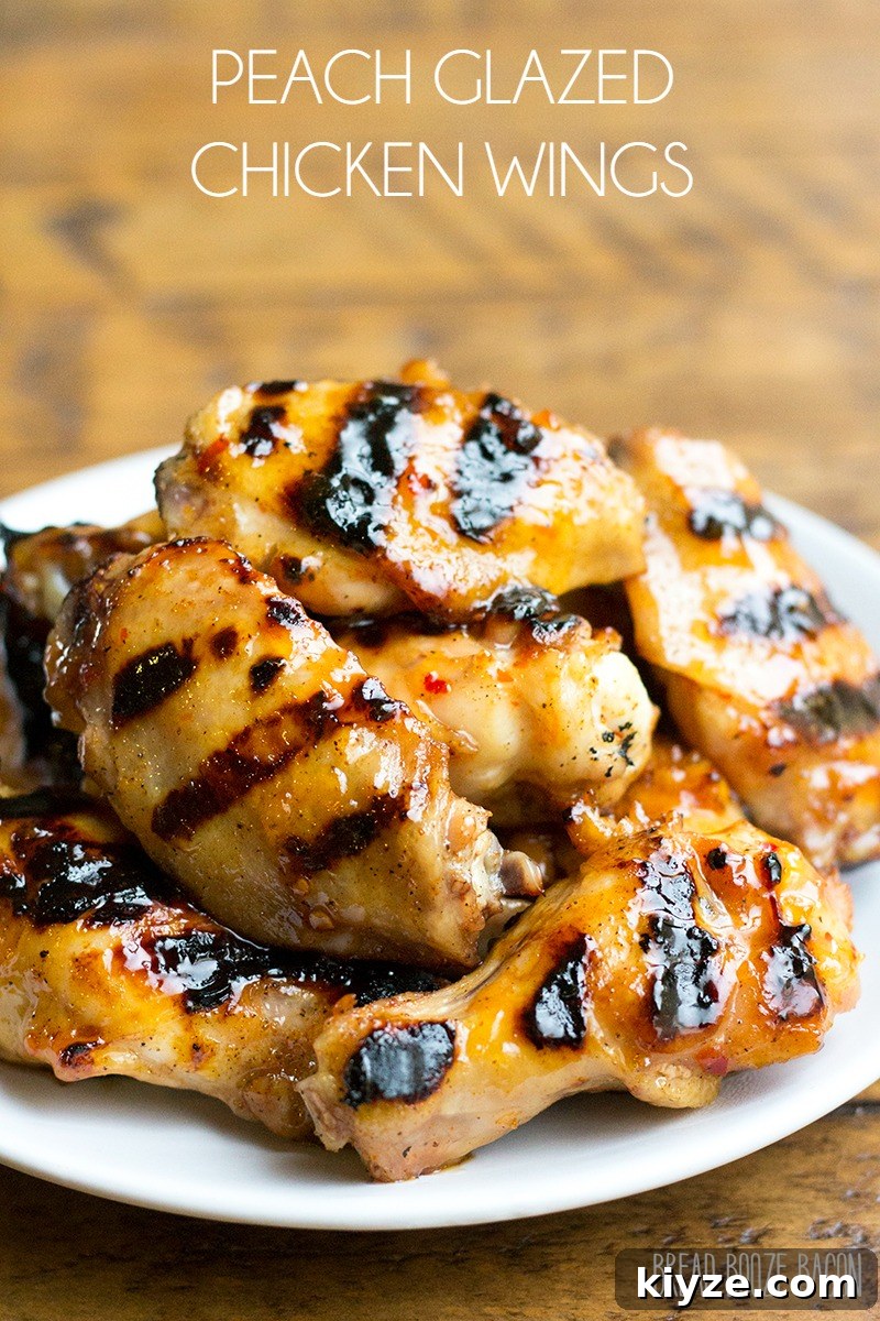 Sticky Peach-Glazed Chicken Wings Recipe 2 Peach Glazed Chicken Wings are a sweet and tangy appetizer you can throw on the grill right alongside your burgers and dogs!