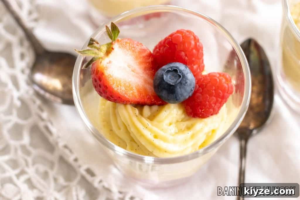 Silky Vanilla Bean Custard Recipe 11 vanilla bean custard in jar with berries