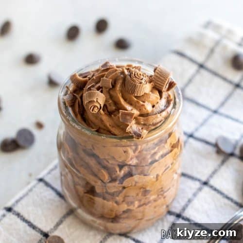 3 ingredient chocolate mousse in a small jar topped with chocolate shavings