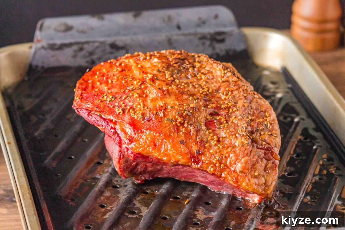 Juicy Oven-Baked Corned Beef Brisket Recipe 7 A corned beef brisket baked golden brown fresh from the oven - Hostess At Heart