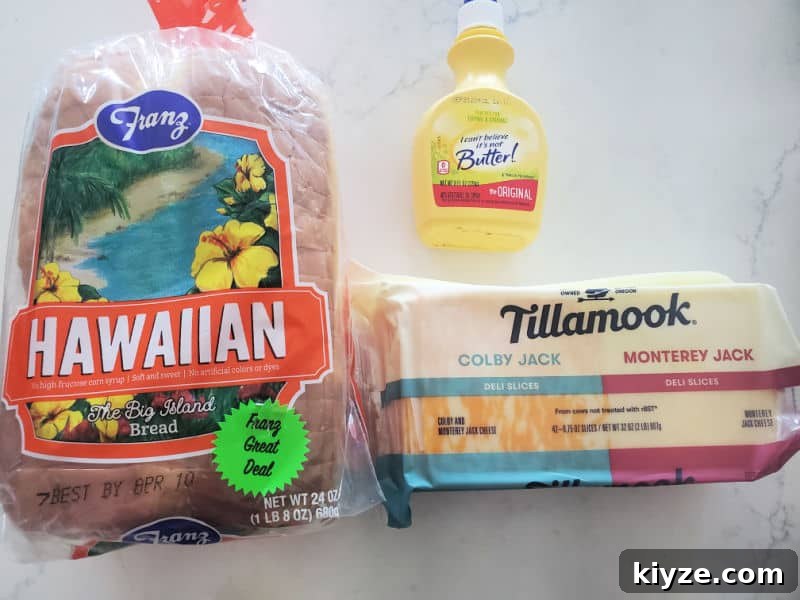 Hawaiian bread, butter spray, and a package of Tillamook sliced cheese 