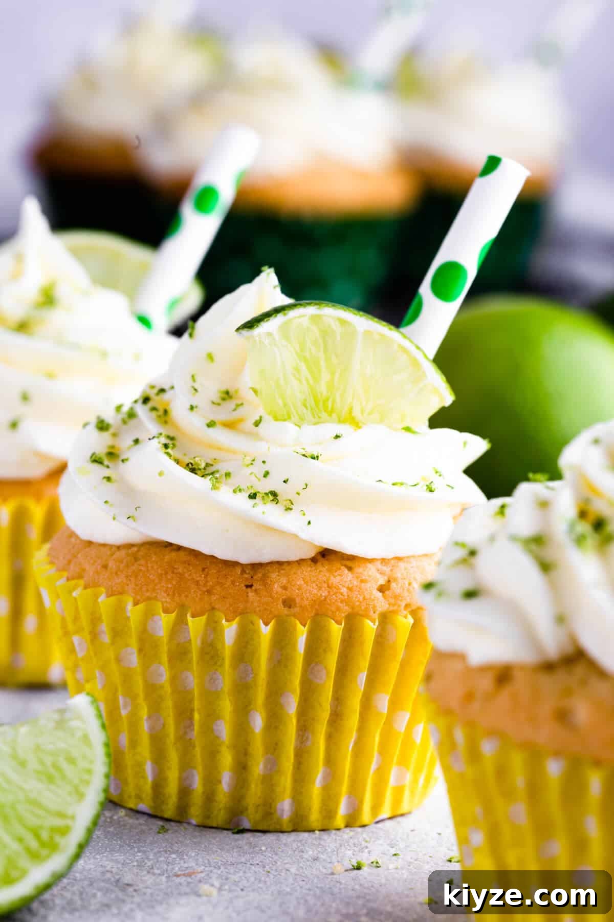 super close up at a gin and tonic cupcake in yellow paper case