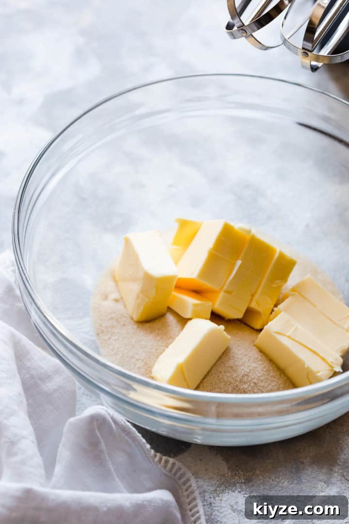 side close up of a glass bowl with butter and sugar