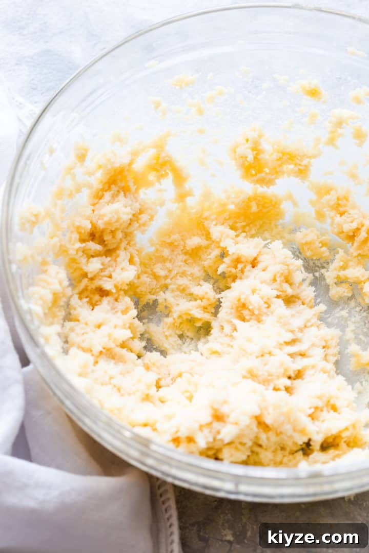 close up of whipped butter and sugar in a bowl