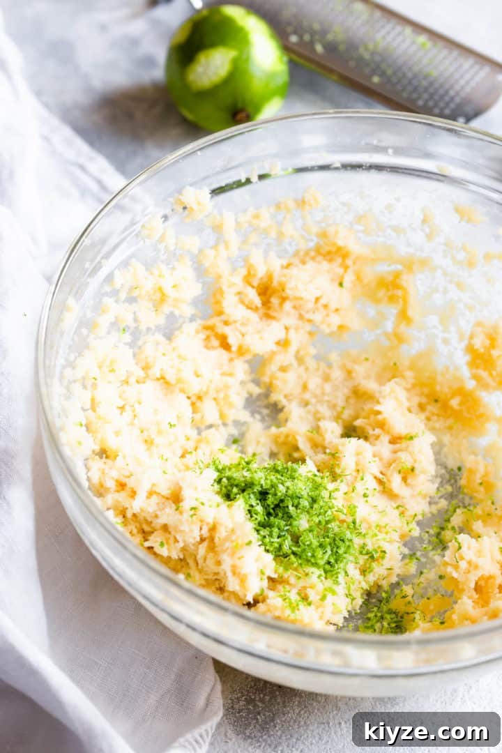side close up of a bowl with whipped butter and lime zest