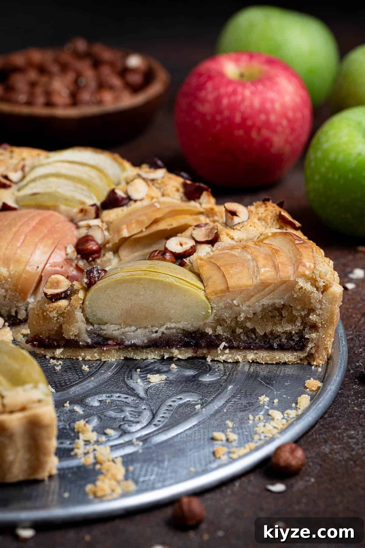 Vegan Apple Hazelnut Frangipane Tart 4 Close up of a slice of the tart.
