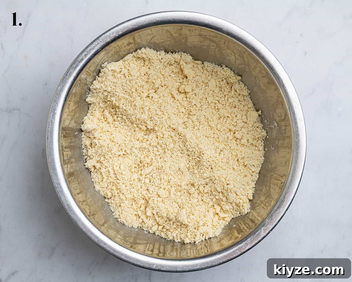Vegan Apple Hazelnut Frangipane Tart 5 Step 1, the butter rubbed into the dry ingredients to make the pastry.