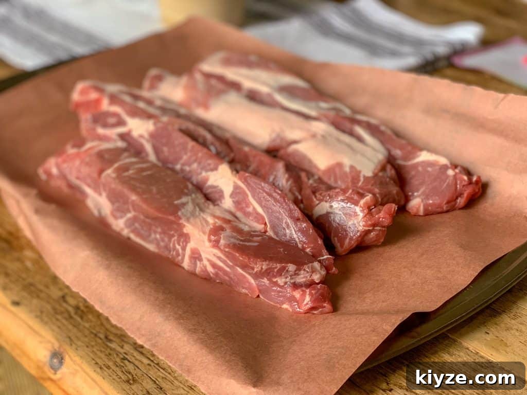 How to Smoke Country-Style Pork Ribs for Tender, Smoky Flavor 2 4 strips of uncooked boneless country style pork ribs