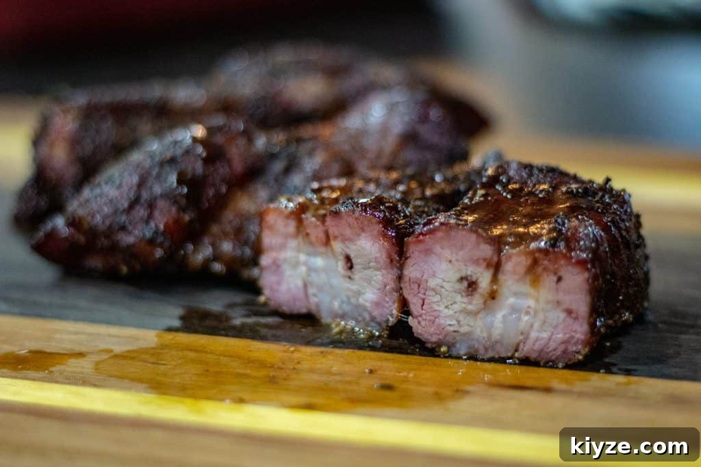 How to Smoke Country-Style Pork Ribs for Tender, Smoky Flavor 5 pork ribs with a good bark and a light bbq sauce glaze