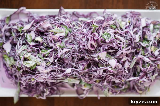 Creamy Cilantro Lime Slaw for Tacos and BBQ 4 Creamy Cilantro Lime Slaw on platter