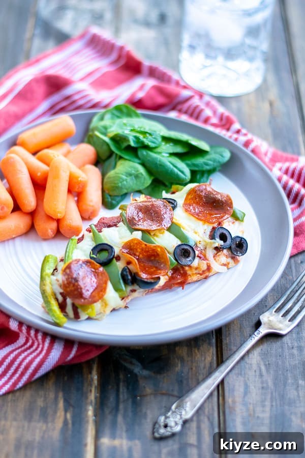 Low-Carb Supreme Pizza Chicken Bake 2 a serving f the supreme pizza chicken on a plate with sides