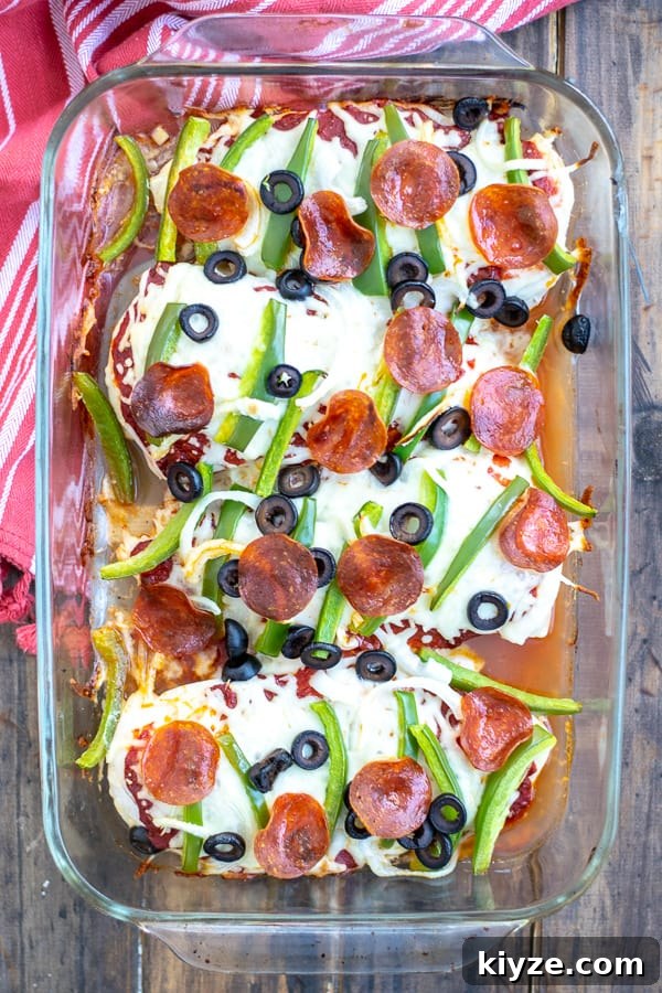 Low-Carb Supreme Pizza Chicken Bake 12 Supreme Pizza Chicken Bake Recipe Low Carb in a glass dish shot from overhead