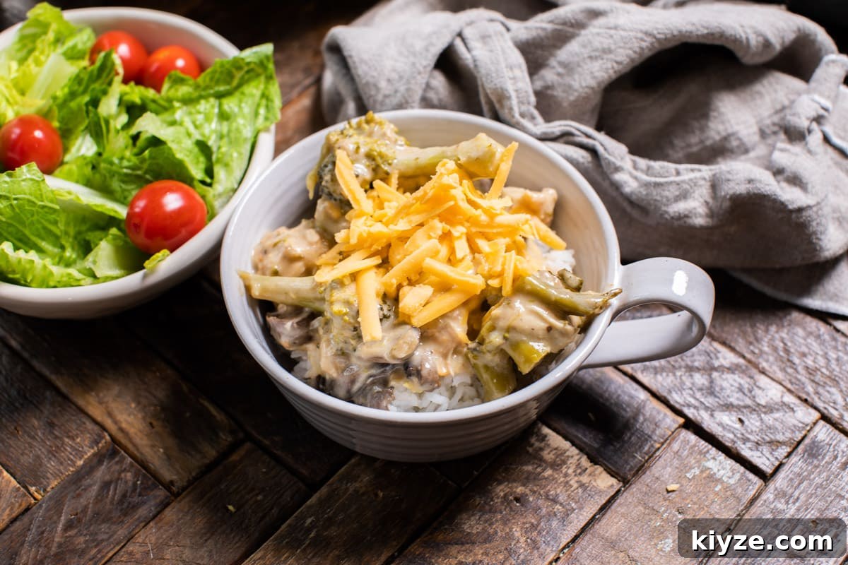 Slow Cooker Cheesy Broccoli Chicken Recipe 6 white bowl with cheesy broccoli chicken in it
