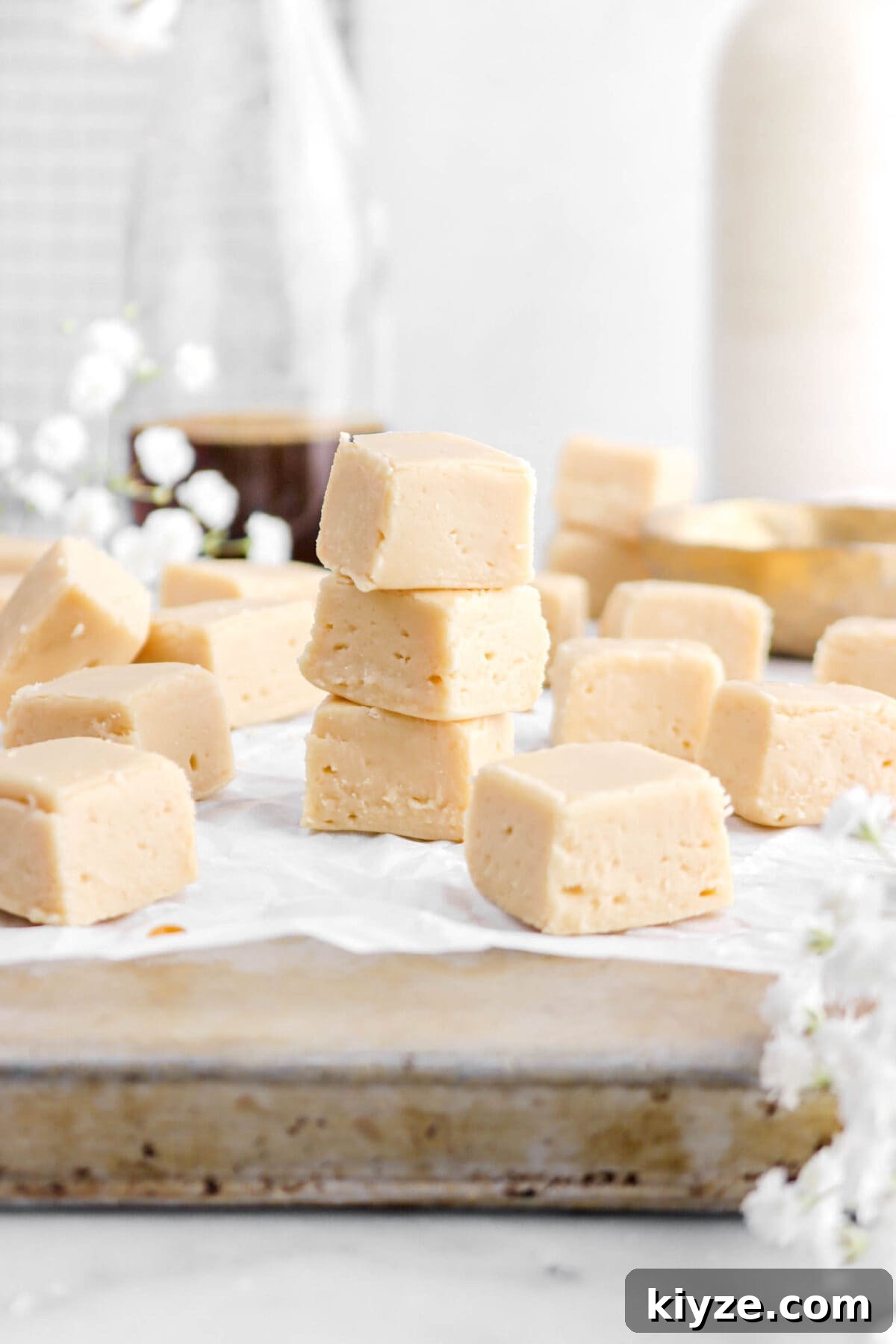 Old-Fashioned Maple Fudge Recipe 2 stacked maple fudge on upside down sheet pan.