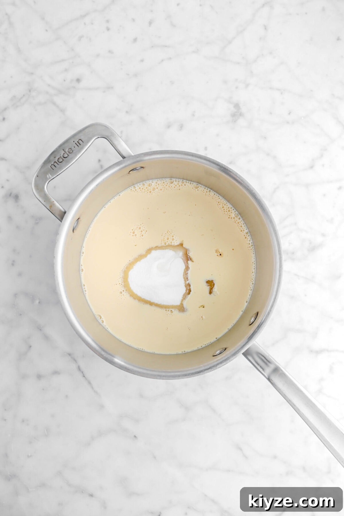 Old-Fashioned Maple Fudge Recipe 7 Evaporated milk, sugar, and maple syrup in large pot.