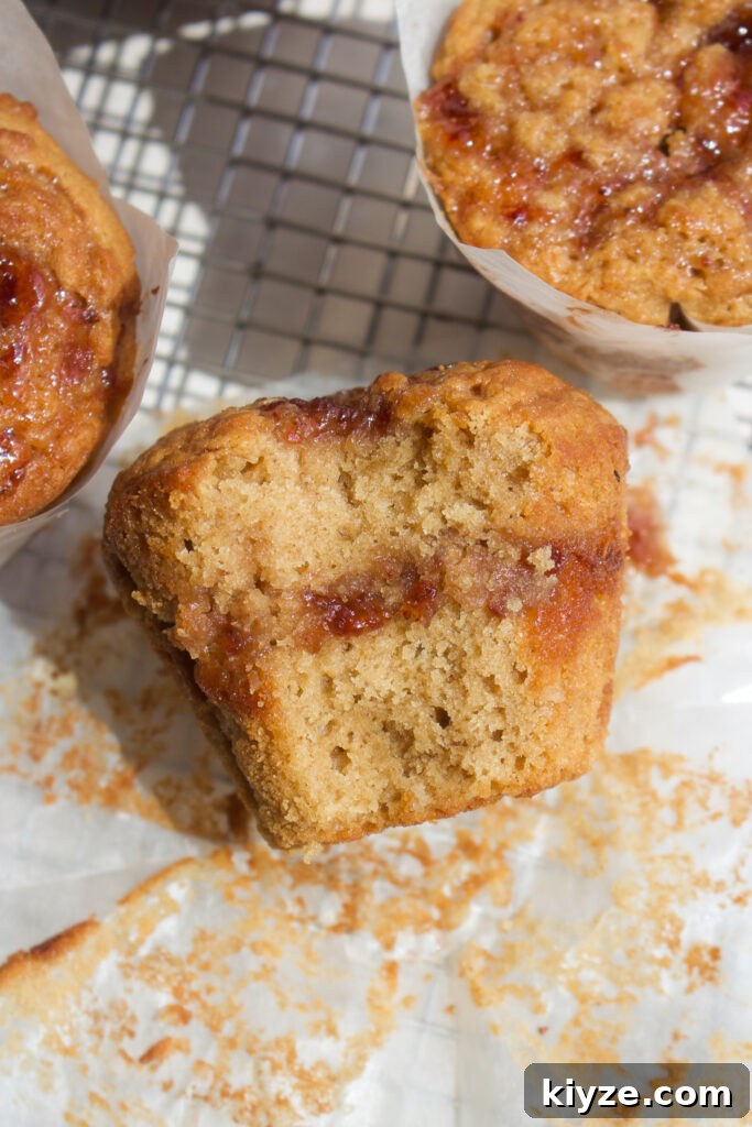 Peanut Butter and Jelly Muffins Recipe with Jam Swirl 5 Freshly baked peanut butter jelly muffins