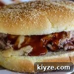 pulled pork sandwich with smoked cheese sauce